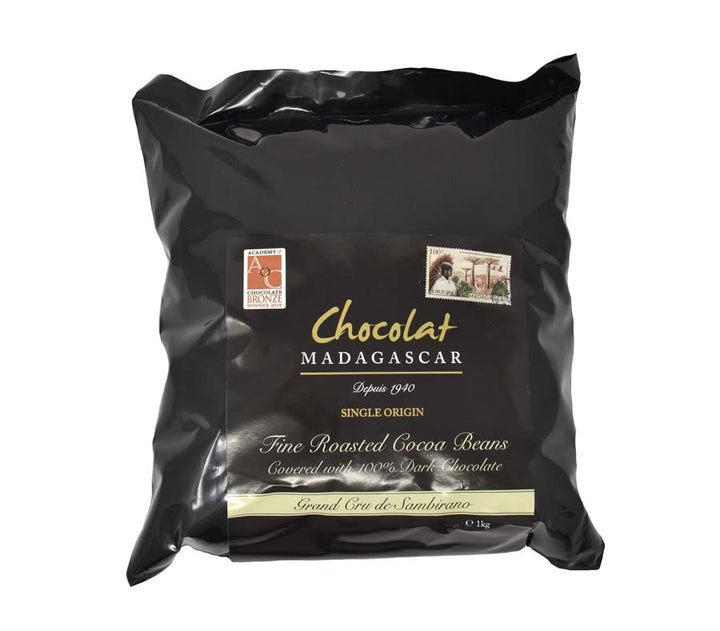 Roasted cocoa beans covered in 100% dark chocolate
