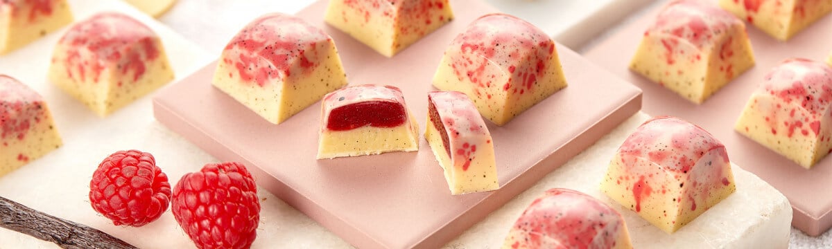 Vanilla and raspberry white chocolate bon bons – Henley Bridge