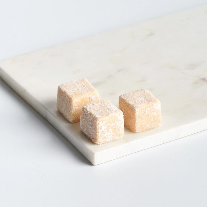 Belcolade Origins Papua-New Guinea cacao-trace white chocolate buttons (36%)  - 5kg & 15kg