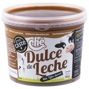 Container of Che Dulce de Leche milk toffee spread with a cow illustration on the label.