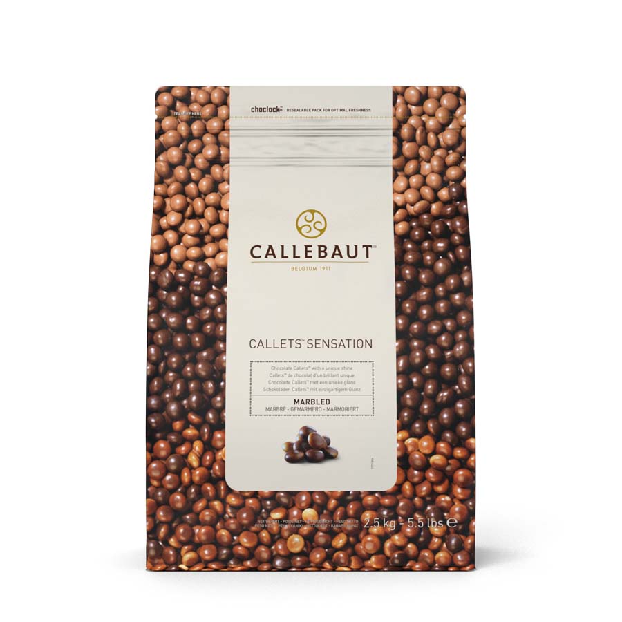 Cocoa pearls with shiny marbled chocolate coating